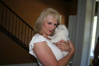 Janice in love with the little fellow.